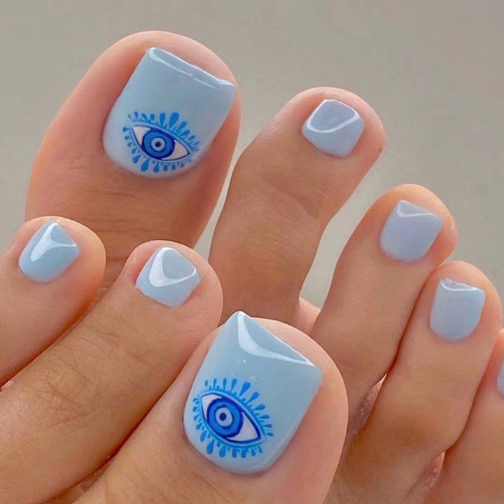Kunstvolle Fußnagelkunst mit Augenmotiv Karnz