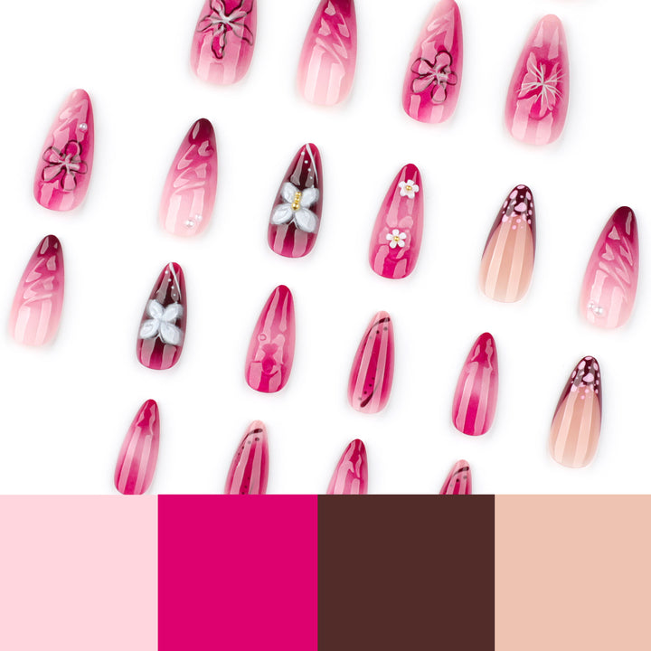 Kunstvolle Nagelverlängerungen mit floralen Details und Ombre-Effekt Karnz