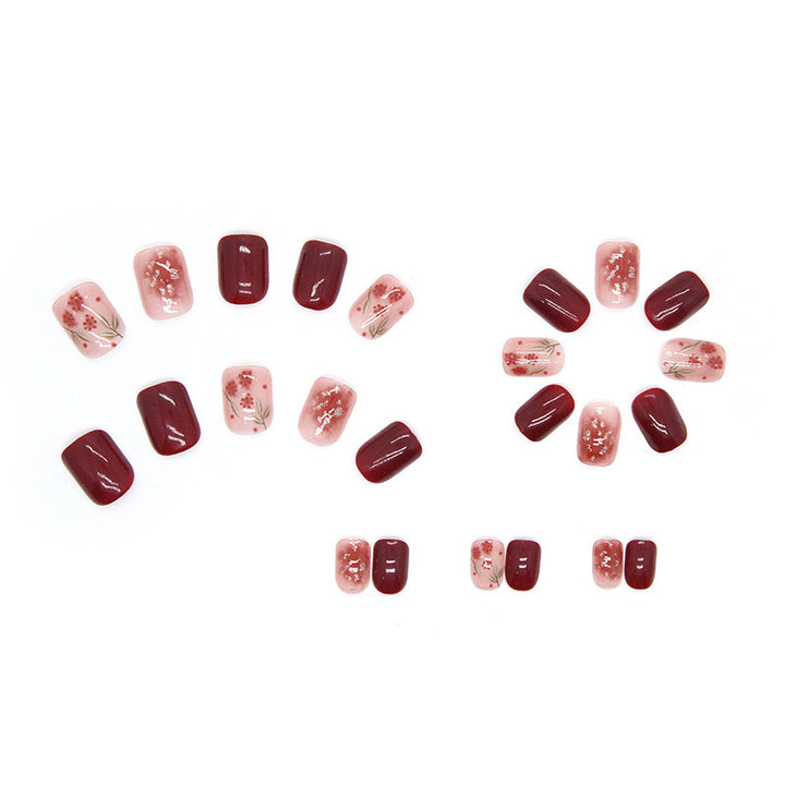 Floral-Design Press-On Nagelset mit Edelsteinakzenten