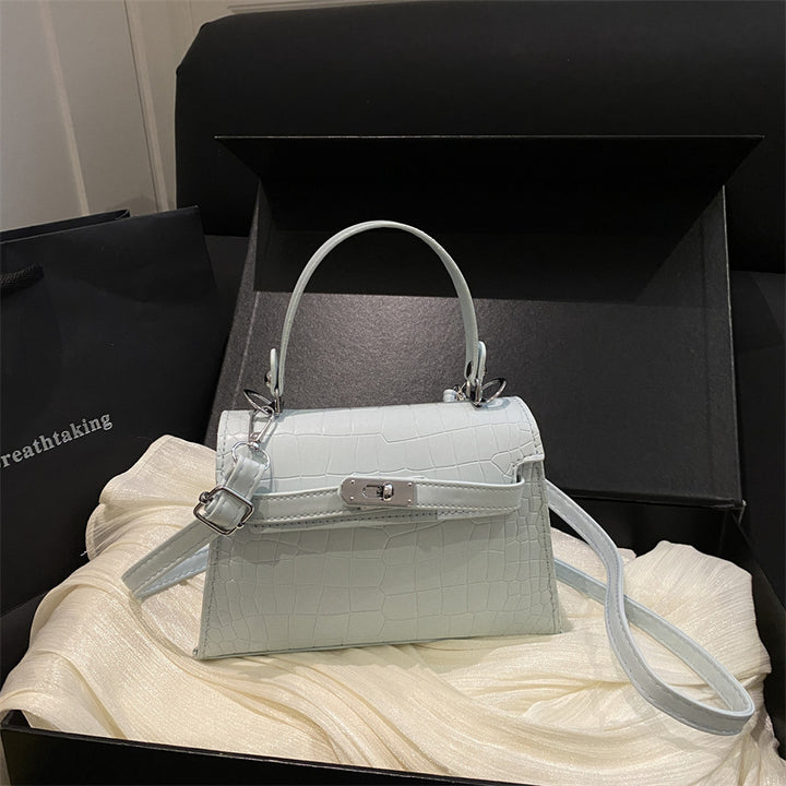 Elegante krokodilgeprägte Handtasche