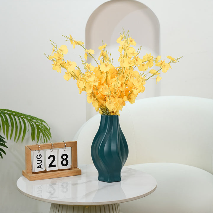 Elegante geschwungene dekorative Blumenvasen Karnz