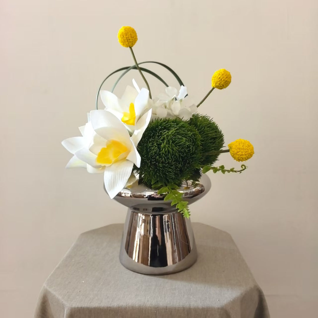 Elegante dekorative Orchideenarrangement