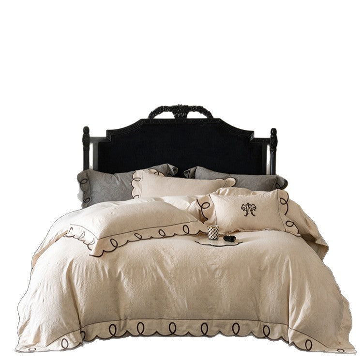 Besticktes Wellen-Loop Jacquard Bettbezug-Set mit passenden Kissenbezügen