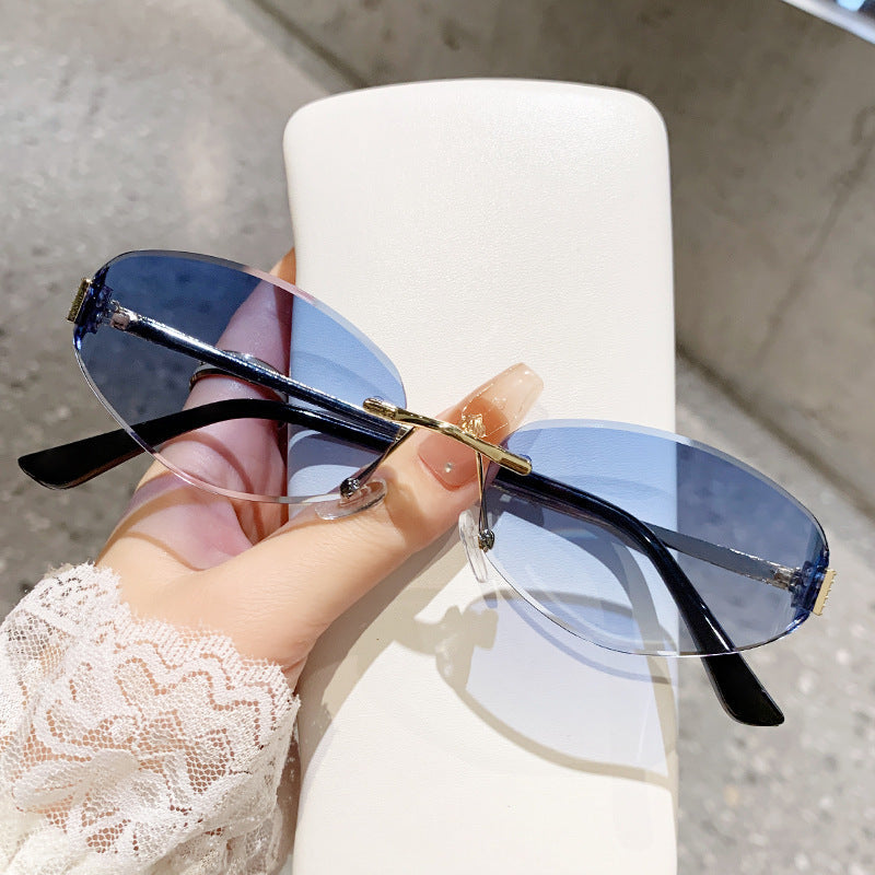 Damen Sonnenbrille im modernen Ovaldesign mit kontrastierendem Rahmen Karnz
