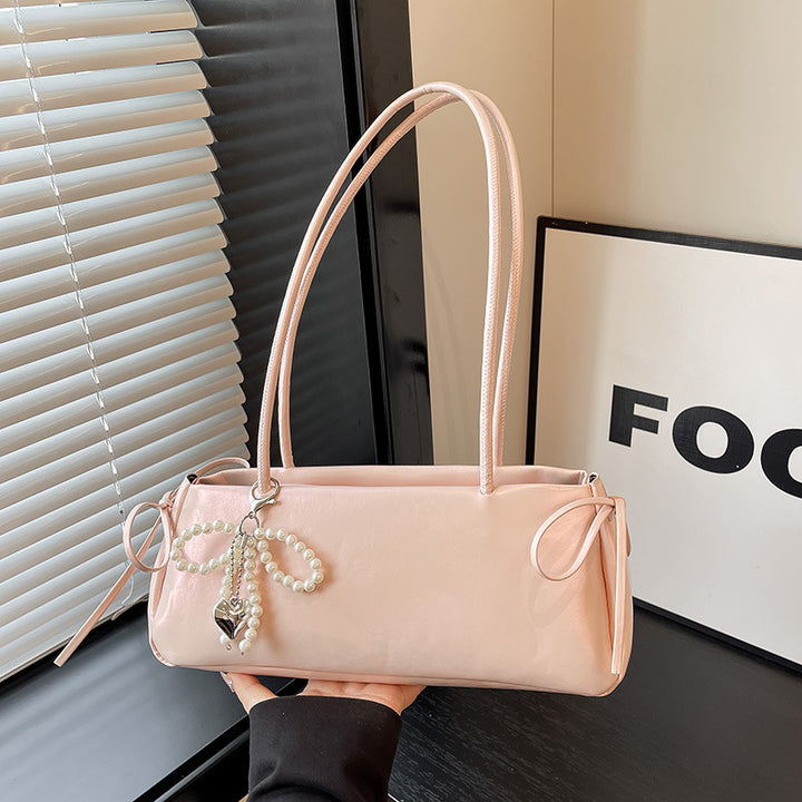 Elegant perlenverzierte Handtasche