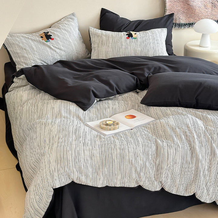 Wendbares strukturiertes Baumwoll-Satin-Bettbezug-Set mit dezenten gestickten Motiven und Kissenbezügen