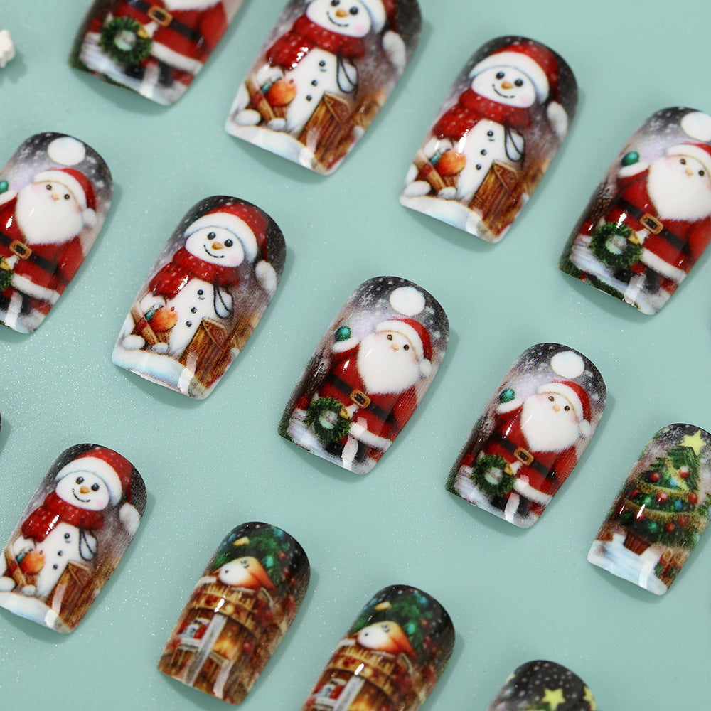 Festliche Kunstnägel mit Weihnachtsmotiven Karnz