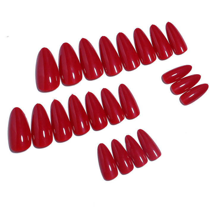 Glänzendes Stiletto Press-On Nagelset mit langlebigem Kleber Karnz