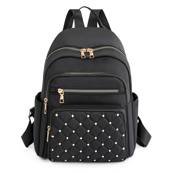 Quilted Rucksack mit dekorativen Nieten Karnz