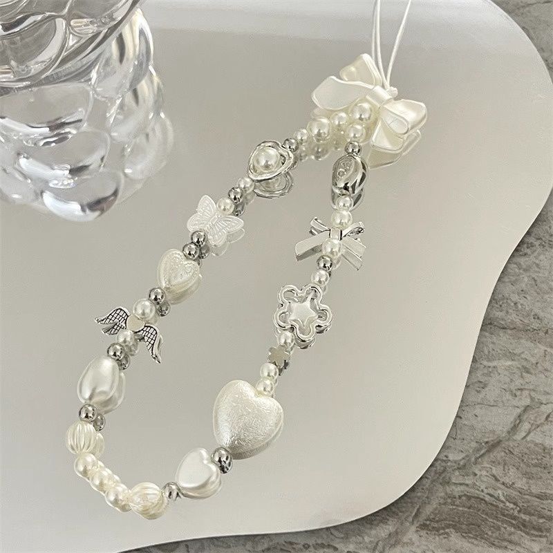 Herz und Schmetterling Charm Perlenarmband Karnz