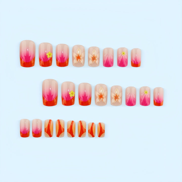 Kreatives Kunstnagelset mit floralen und Ombre-Designs Karnz