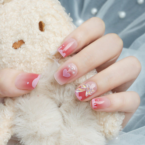 Romantisches Herzdesign Press-On Nagelset Karnz