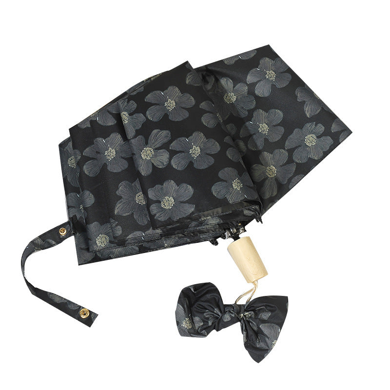 Damen Mini Faltregenschirm mit elegantem Blumendruck Karnz