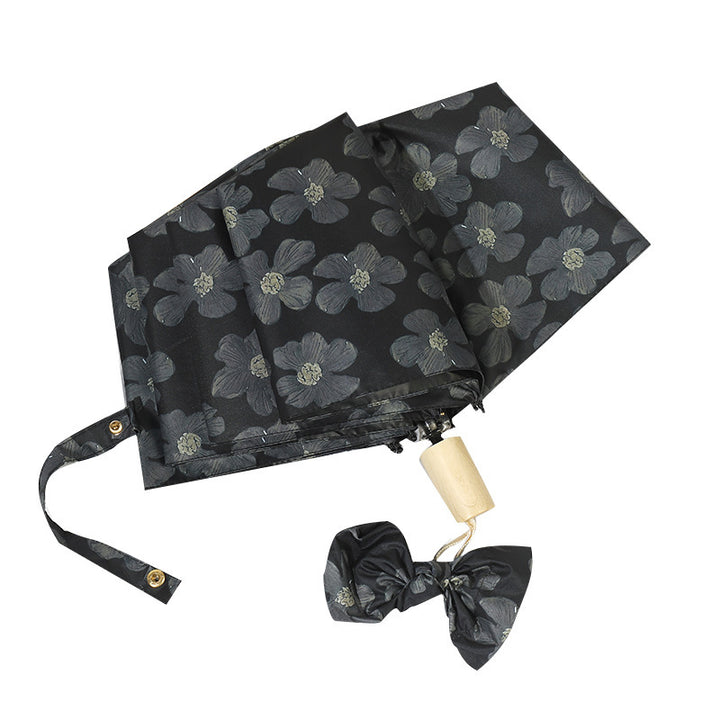 Damen Mini Faltregenschirm mit elegantem Blumendruck Karnz