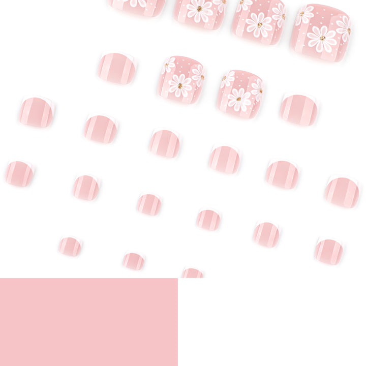 Kunstvolle Fußnagelkunst mit eleganten Gänseblümchen-Motiven Karnz