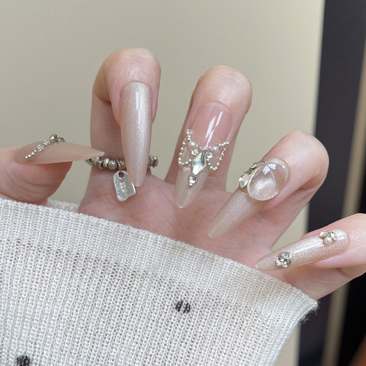 Elegante Stiletto Press-On Nagelkunst mit Strass- und Perlenakzenten Karnz