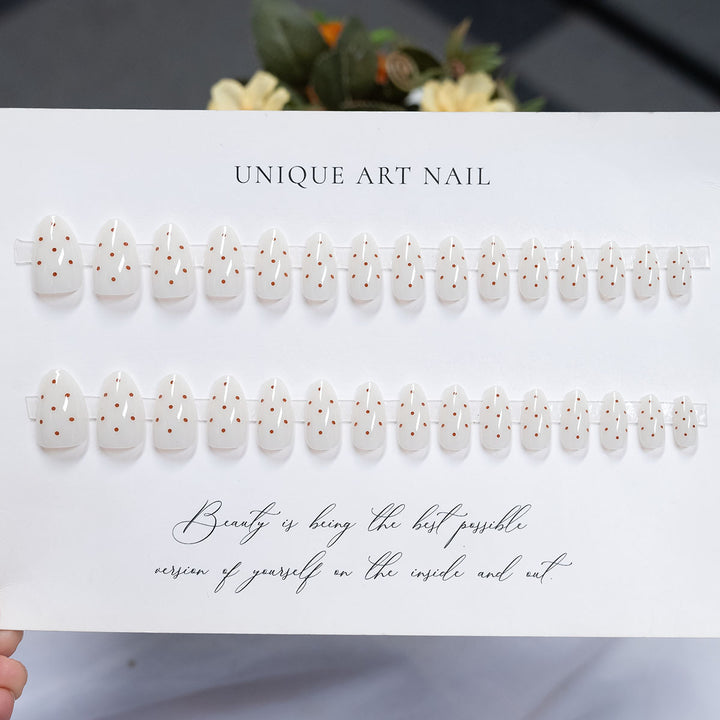 Künstlerisches Press-On Nagelset mit einzigartigem Punktdesign