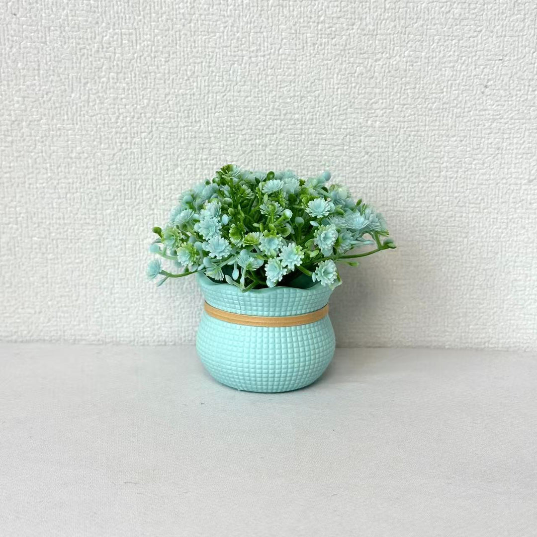 Dekorative Miniatur Kunstblumen Arrangement