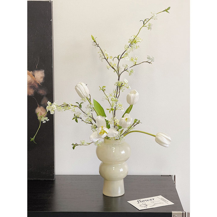 Dekorative künstliche Blumenarrangement