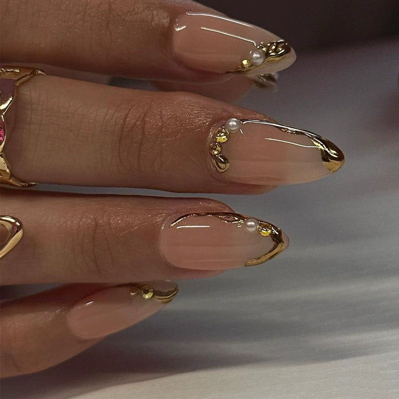Dekorative Gold-akzentuierte Acryl-Nagelkunst Karnz