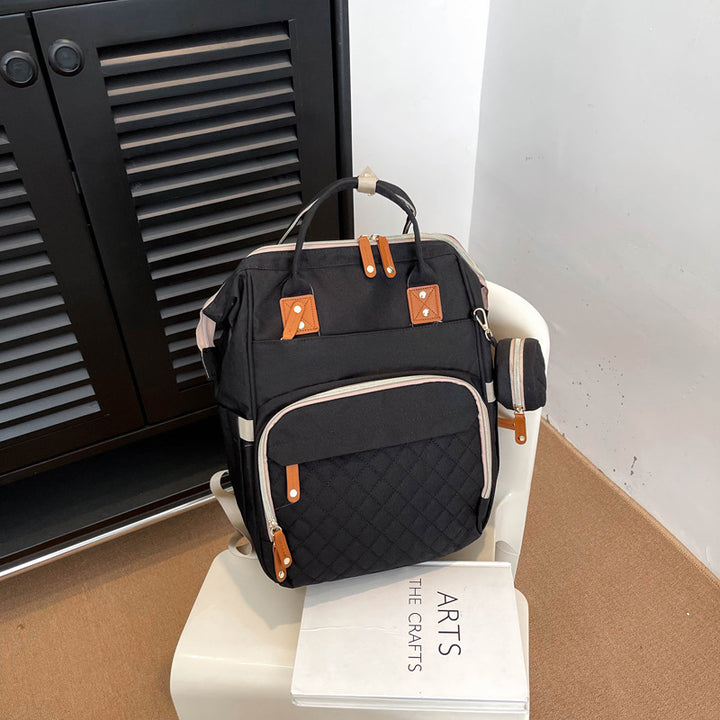 Multi-Taschen Stepp Rucksack Karnz