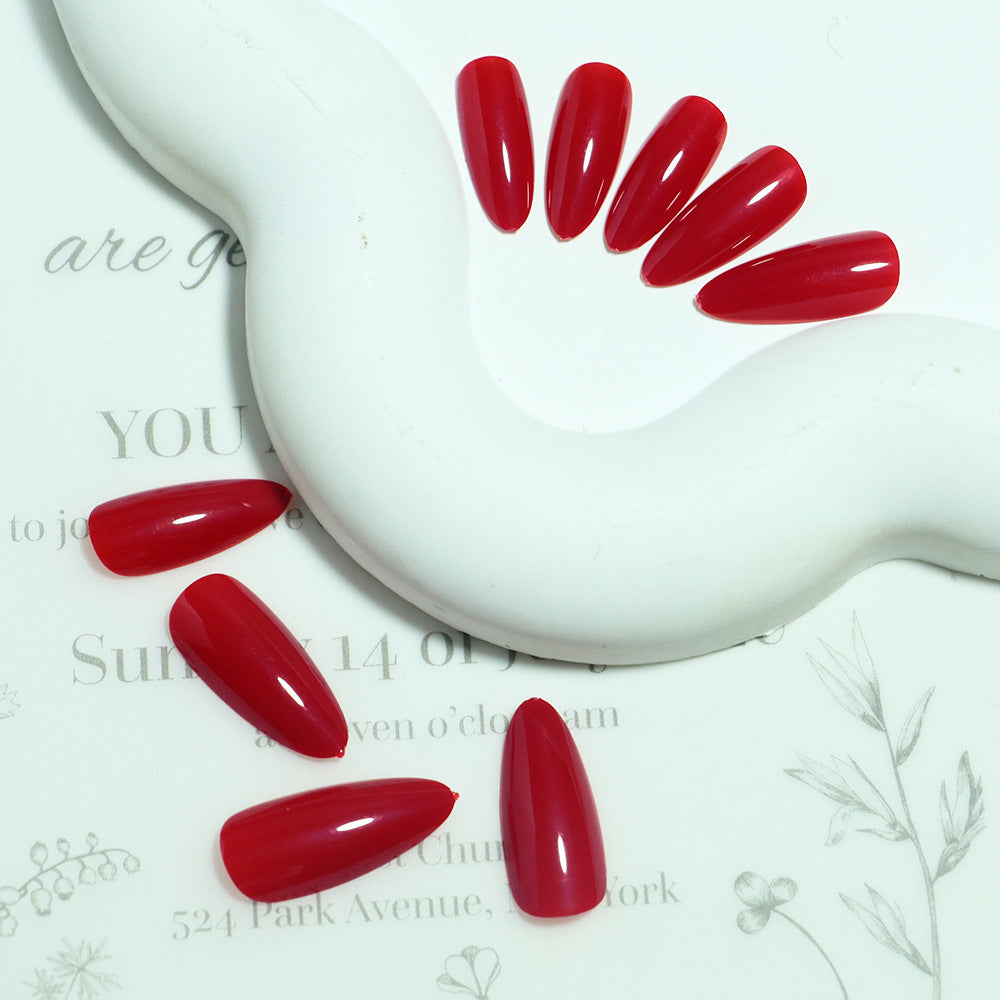 Glänzendes Stiletto Press-On Nagelset mit langlebigem Kleber Karnz