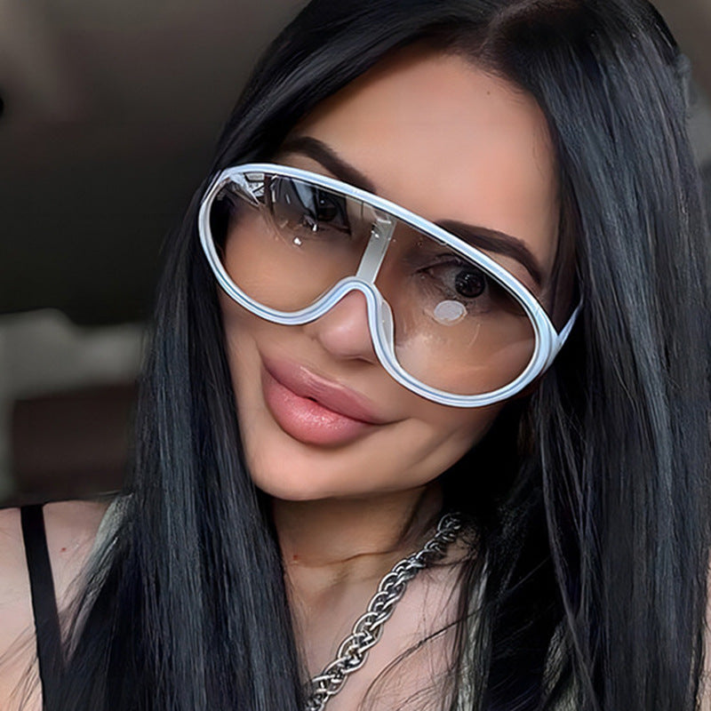Damen futuristische Sonnenbrille mit großflächigen Gläsern und ergonomischem Rahmen Karnz