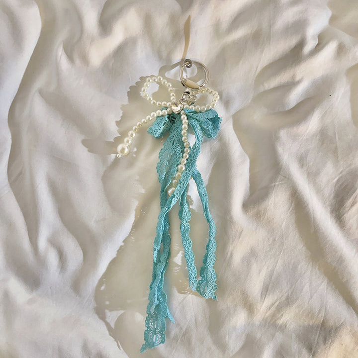 Eleganter mit Perlen verzierter Charm-Schlüsselanhänger Karnz
