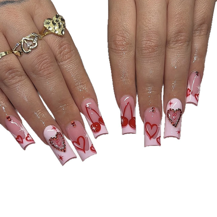 Kunstnagelset mit romantischen Herzmotiven und funkelnden Strassverzierungen Karnz