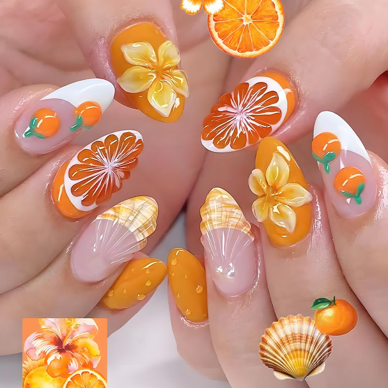 Kunstnagelset mit fruchtigen Motiven und glamourösen Akzenten Karnz