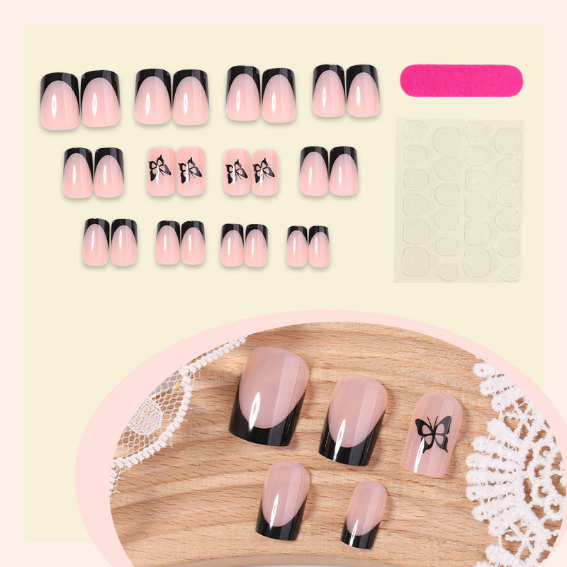 Dekoratives Press-On Nagelset mit eleganten Schleifenakzenten Karnz