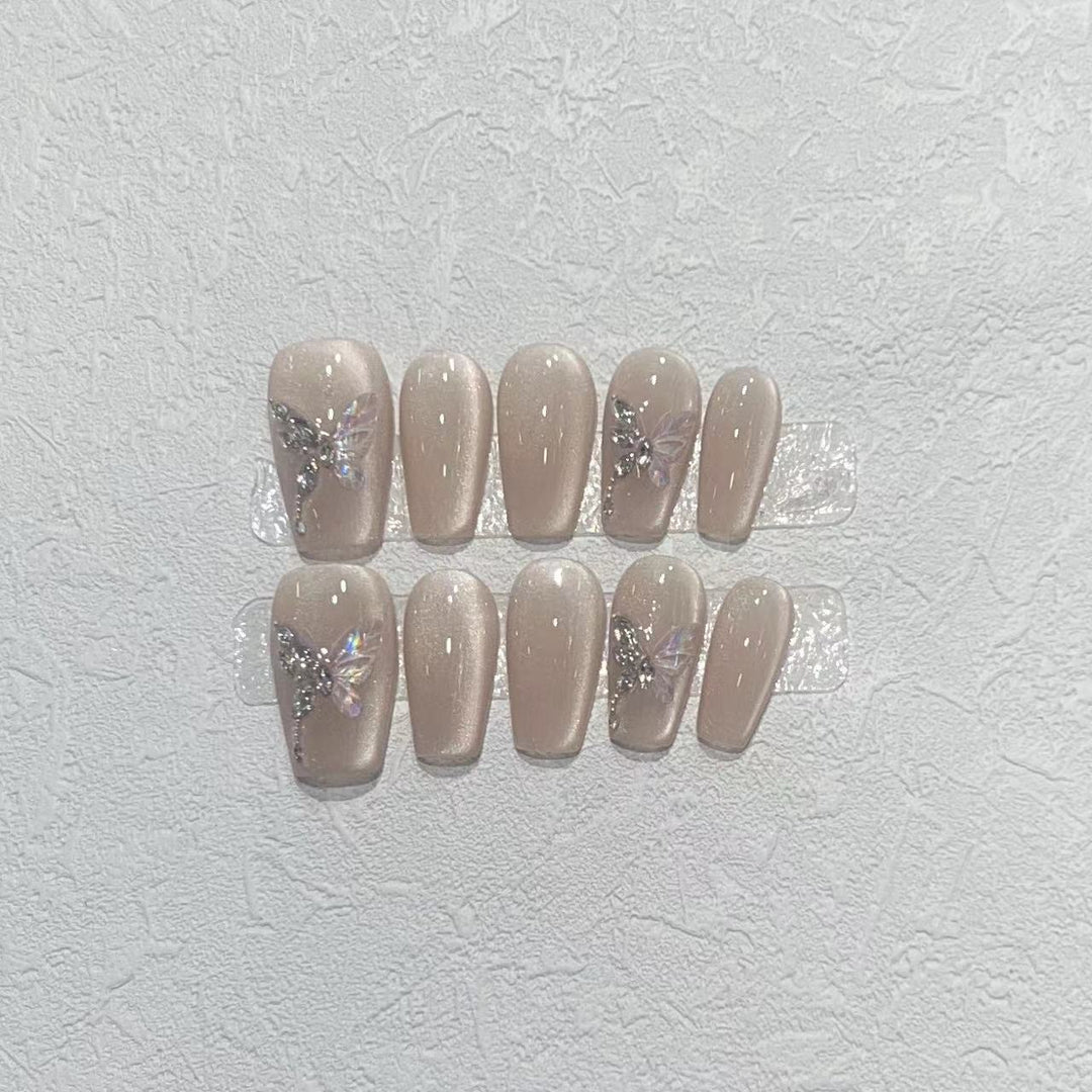 Stilvolles Press-On Nagelkunst-Set mit eleganten Schmetterlings- und Juwelenelementen Karnz