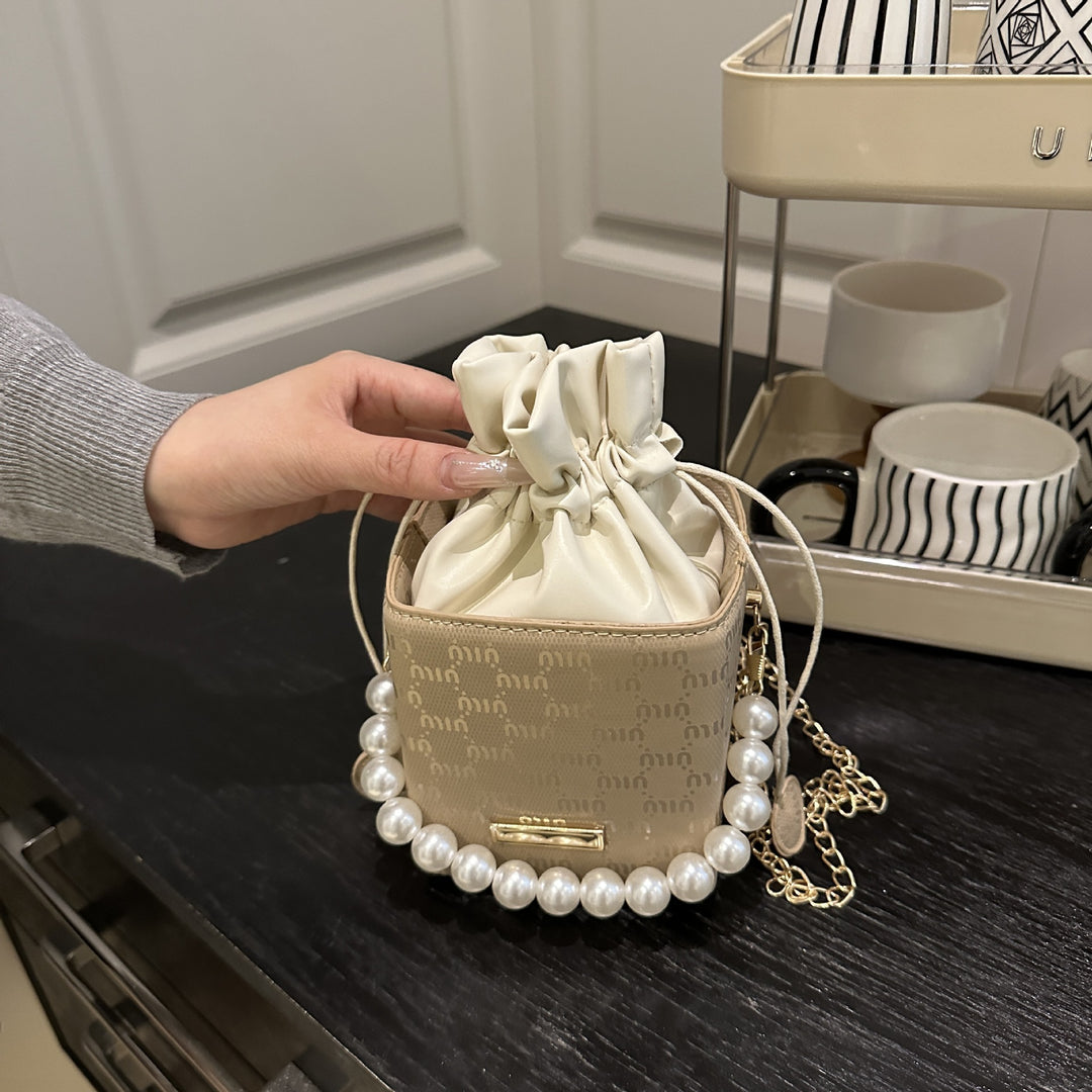 Elegante Mini-Eimer-Tasche mit Perlenhenkel Karnz