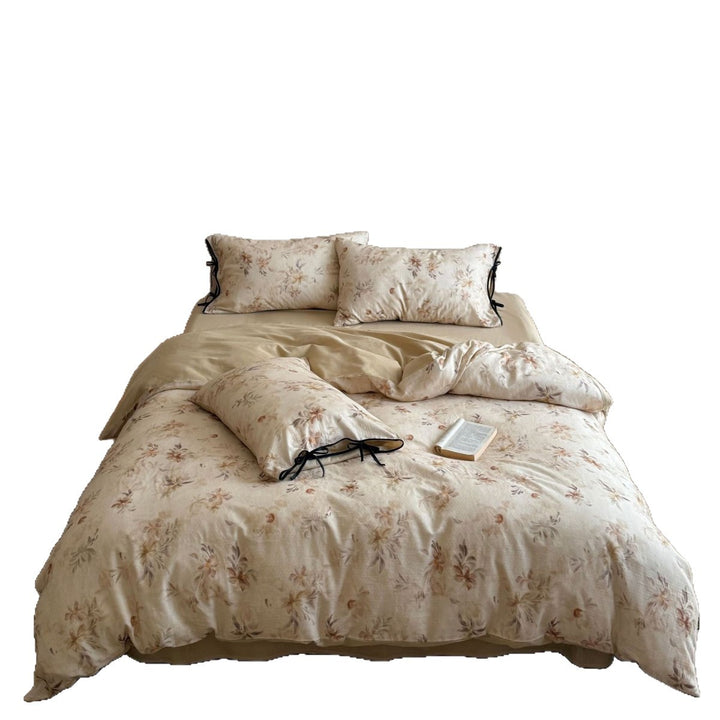 Bettwaren-Set aus Baumwoll-Leinen mit zartem Aquarell-Blumenprint und dekorativen Bindebändern