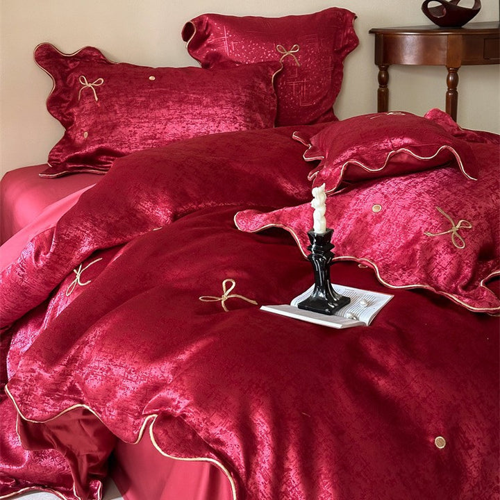 Luxuriöses Satin-Bettwäsche-Set mit Schleifenstickerei und Paspelierung Karnz