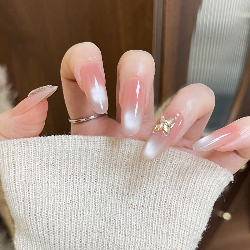 Elegante Ombre Press-On Nägel mit floralen Schmetterlingsakzenten Karnz