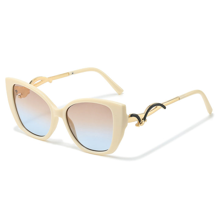 Übergroße Geometrische Katzenaugen-Sonnenbrille mit goldenen Akzenten Karnz