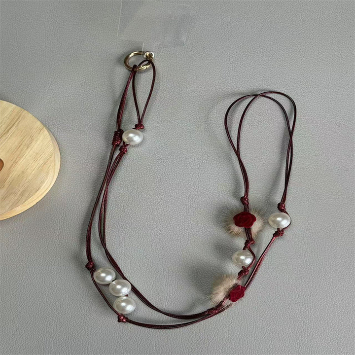 Elegante Perlen Brillenband Karnz