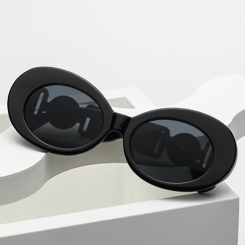 Damen modische Sonnenbrille mit auffälligen goldenen Akzenten Karnz