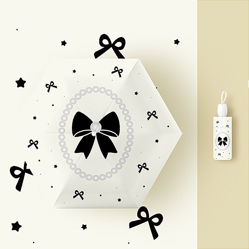 Damen Faltregenschirm mit verspieltem Blumendesign Karnz