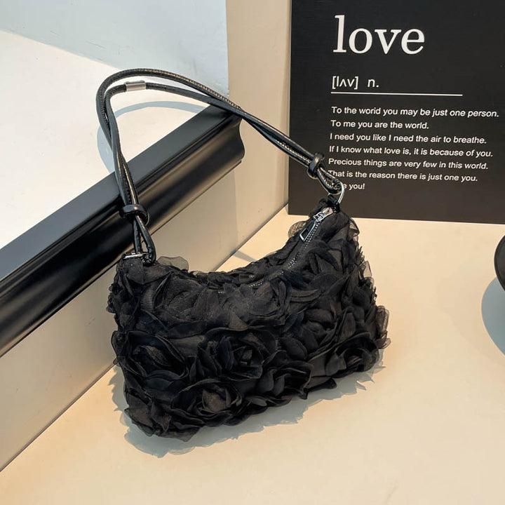 Blumenverzierte Handtasche