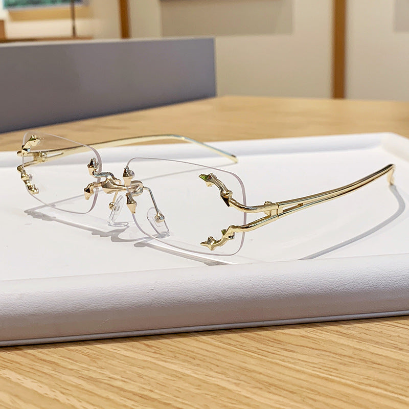 Damen modische Sonnenbrille mit filigranem Metallrahmen und transparenten Gläsern Karnz