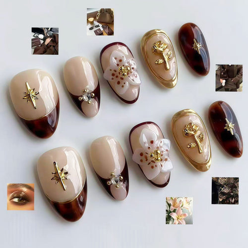 Dekoratives Press-On Nagelkunst Set mit floralen und goldenen Akzenten