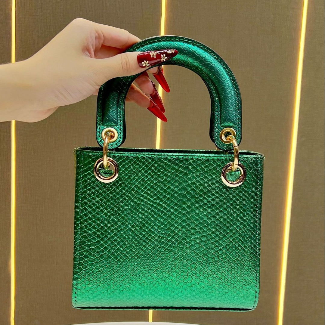 Stylische Schlangenleder-texturierte Handtasche