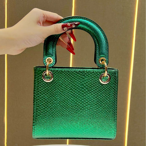 Stylische Schlangenleder-texturierte Handtasche