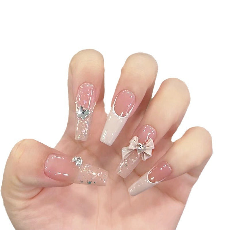 Kunstfingernägel mit Glitzerakzenten und Verspielten Motiven Karnz