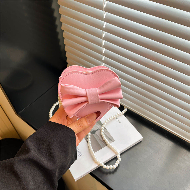 WoHerzförmige Schleifen-Clutch Tasche Karnz