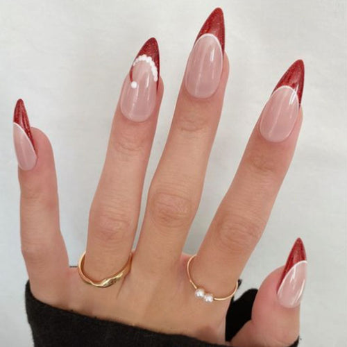 Künstlerische French Tip Press-On Nägel mit Glitzerakzenten Karnz