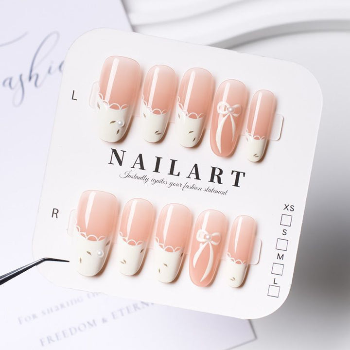 Künstlerisches Press-On-Nagelset mit elegantem Schleifen-Design Karnz