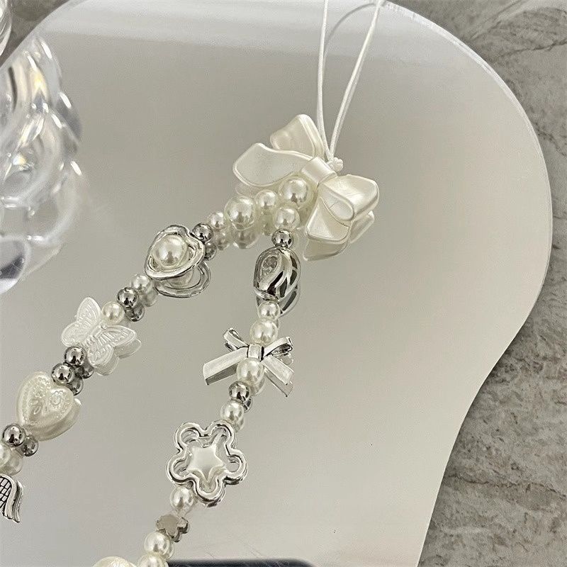 Herz und Schmetterling Charm Perlenarmband Karnz